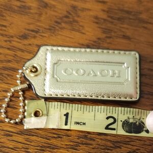 Coach Gold Hang Tag